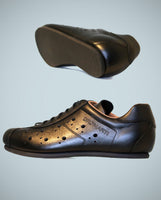 Flat plain soled black leather cycling shoes. L'Eroica events with toe clips and straps. L'eroica 